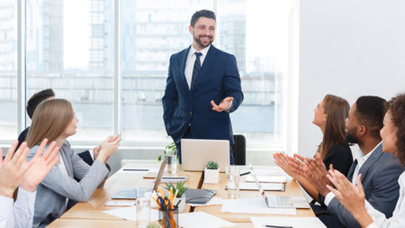 Business team congratulating successful manager with applause