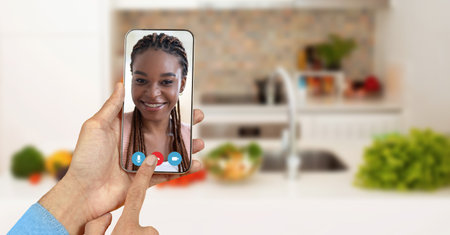 Engaging in a video call at home on a smartphone with a friendly conversation