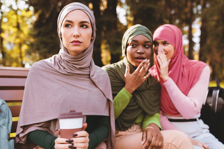 Muslim Ladies Sitting Outdoorsの写真素材