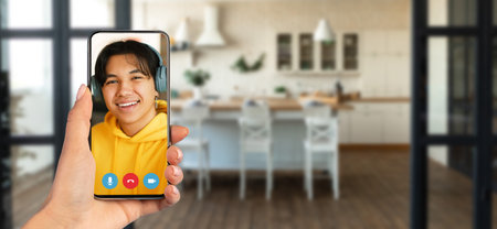 Engaging in a friendly video call from home with a smartphone in hand