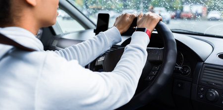 Driver enjoys driving in new car around city