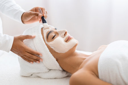 Tranquil woman with facial treatment at day spaの写真素材
