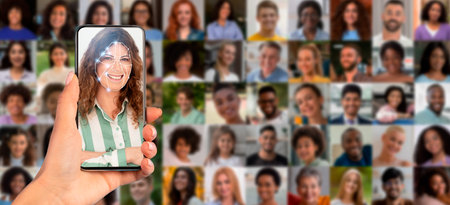 Face recognition technology in action using smartphone for identity verificationの写真素材