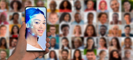 Face recognition technology on a smartphone for identification in modern societyの写真素材