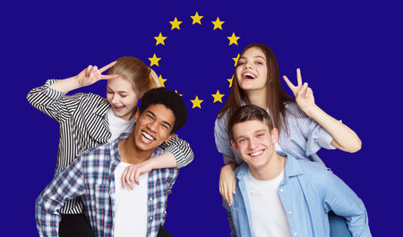 Group Of Happy Multi Ethnic Students Standing In Front Of EU Flag