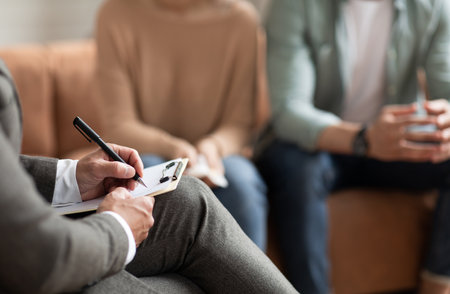 Couple having therapy session with male professionalの写真素材