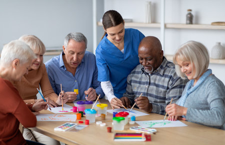 Creative senior men and women doing arts and crafts together