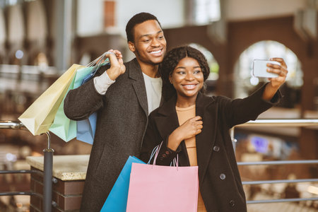 Shopping together during season sale and Black Fridayの写真素材
