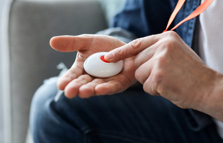 Closeup Of Mans Hand Pressing Alarm Button For Emergencyの写真素材