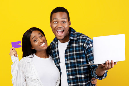 Online shopping, black friday and payment with moneyの写真素材