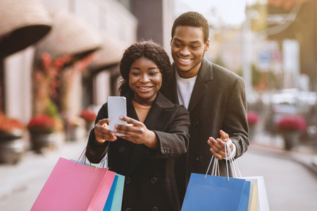 Fun together and selfies during Black Friday and season saleの写真素材