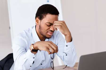 Exhausted african american manager suffering from burnout