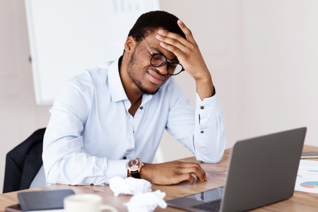Desperate african american manager suffering from crisis