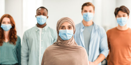 Diverse group of international people wearing medical protective face masks
