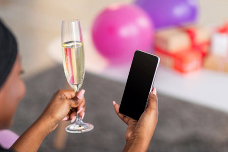 Smartphone with blank screen in black lady hand, celebration online
