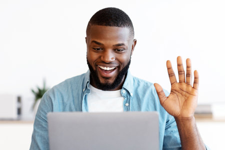 Video Call. Positive Young Black Guy Having Web Conference On Laptopの写真素材