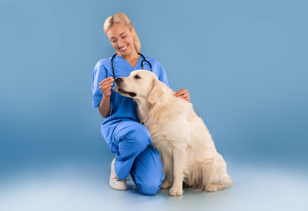 Nurse In Scrubs Uniform Posing With Dog Giving Foodの写真素材