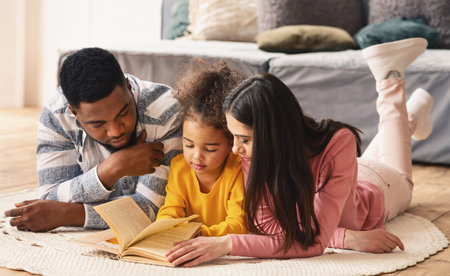 Reading lessons in an international family at homeの写真素材