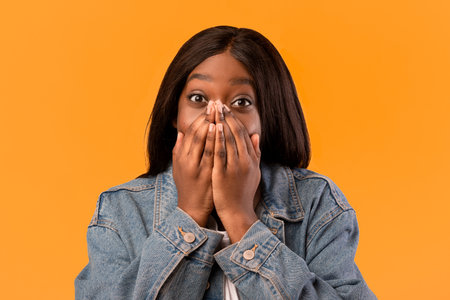 Closeup of emotional african american woman showing amazement