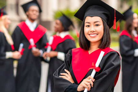 Happy asian lady student having graduation party