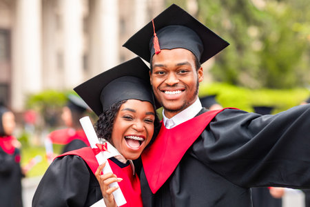 Happy african american couple students taking selfie, closeupの写真素材