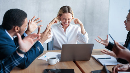 Business People Shouting At Unhappy Businesswoman Blaming Her In Officeの写真素材