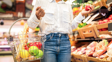 African American Woman Doing Grocery Shopping In Supermarket, Croppedの写真素材