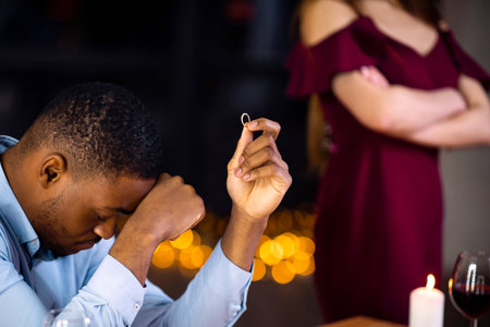 Desperate Black Man Sitting With Ring In Hand After Girlfriend Refused Proposal