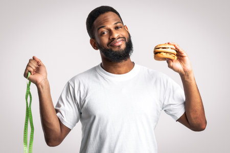 African Man Choosing Between Burger And Skipping Rope, White Background