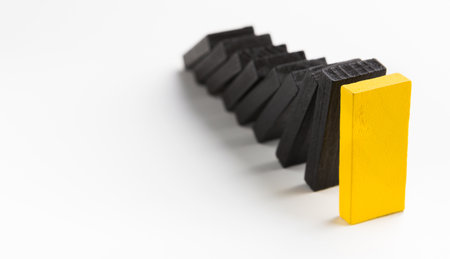 Domino effect stopped by unique strong piece