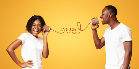 African guy saying words of love to his happy girlfriend