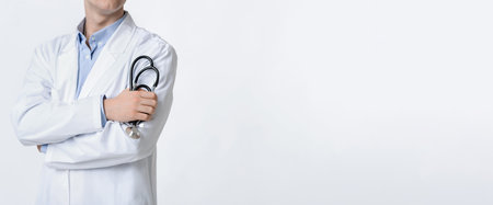 Doctor with stethoscope in his hands, croppedの写真素材