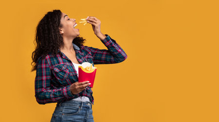 African American Lady Eating Delicious French Fries