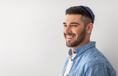 Closeup portrait of smiling jewish man in yarmulkeの写真素材