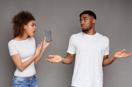 Girlfriend asking for explanation to her cheater boyfriendの写真素材