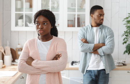 Marriage Crisis. Young African American Spouses Ignoring Each Other After Argueの写真素材