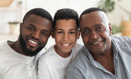 Male Family Members. Portrait Of Handsome African Grandfather, Father And Son