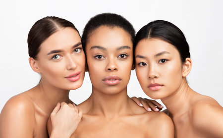 Three Mixed Girls Looking At Camera Posing Naked, Studio Shotの写真素材