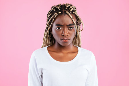 Sad african american woman feeling upset and depressedの写真素材