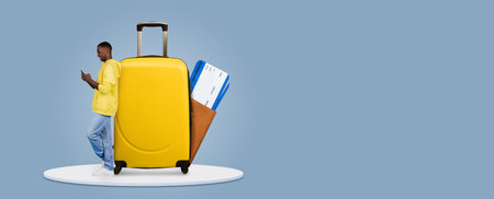 Travel enthusiast checks booking app while preparing for summer vacationの写真素材