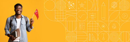 Happy student celebrating education with books and a flag in a bright settingの写真素材