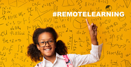 Coronavirus online schooling. African American girl pointing at hashtag REMOTE LEARNING and math...