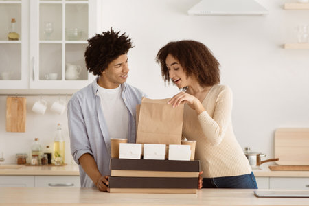 Delivery of delicious food home, positive emotions during covid-の写真素材