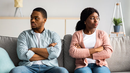 Disappointed african american couple having relationships crisis