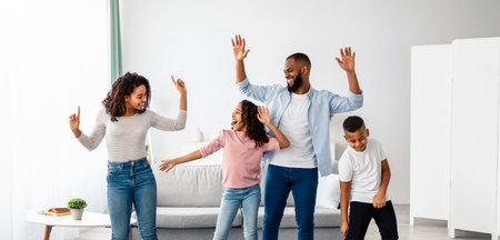 African american parents dancing to music with little childrenの写真素材