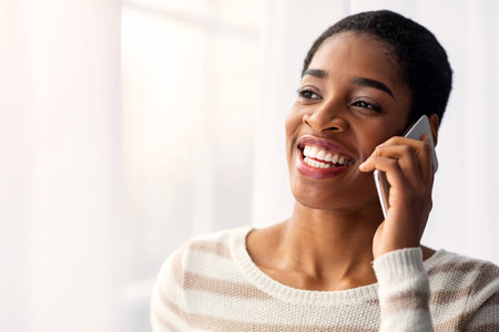 Phone Call. Closeup Shot Of Black Female Having Mobile Conversation On Cellphoneの写真素材