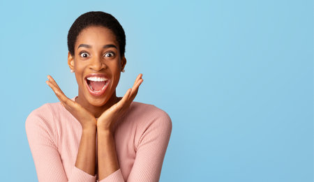 Human Emotions Concept. Portrait Of Surprised Black Lady Exclaiming With Excitement
