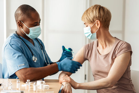 Professional care of health, work of medical personal during coronavirus vaccination campaign