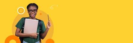 Student with a laptop and pen in a bright, modern classroom