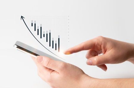 Collage of female holding smartphone and financial chart graph with rising arrow